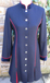 J 1 navy single breasted coat dress with Navy velvet mandarin collar, sleeve inset, kick pleats and  trmmed with Red.jpg